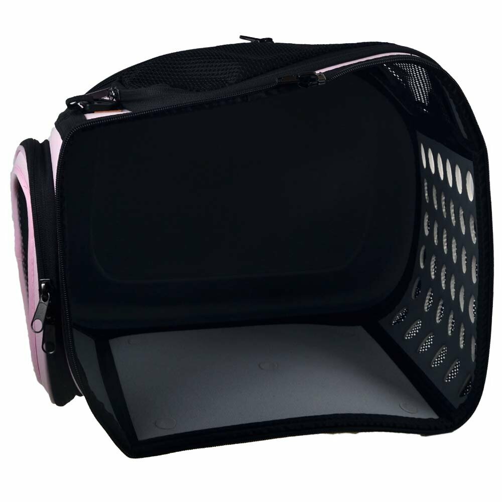 Spacious dog carrier with safety belt