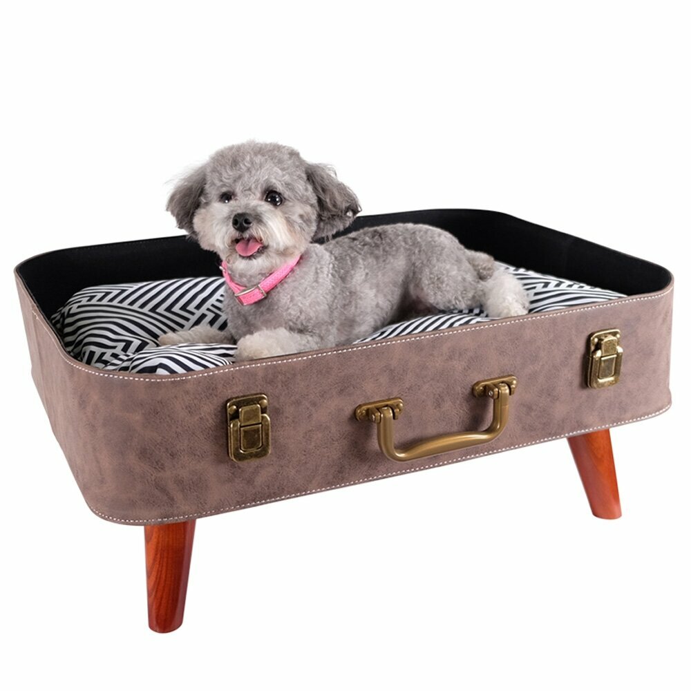 Beautiful dog bed in the form of a suitcase