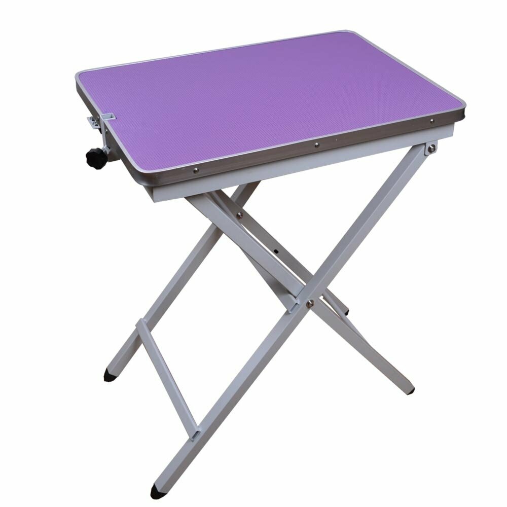 Purple, height-adjustable grooming table