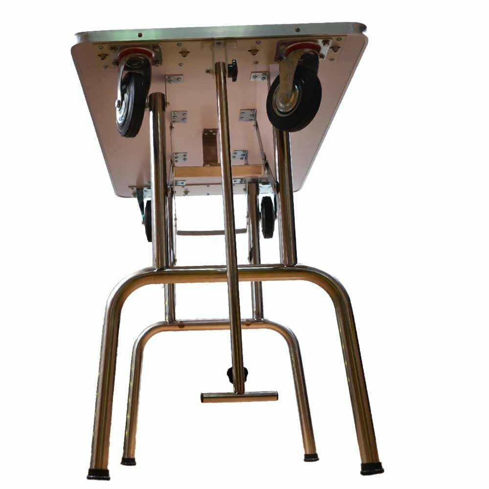 Grooming table with wheels and pull rod