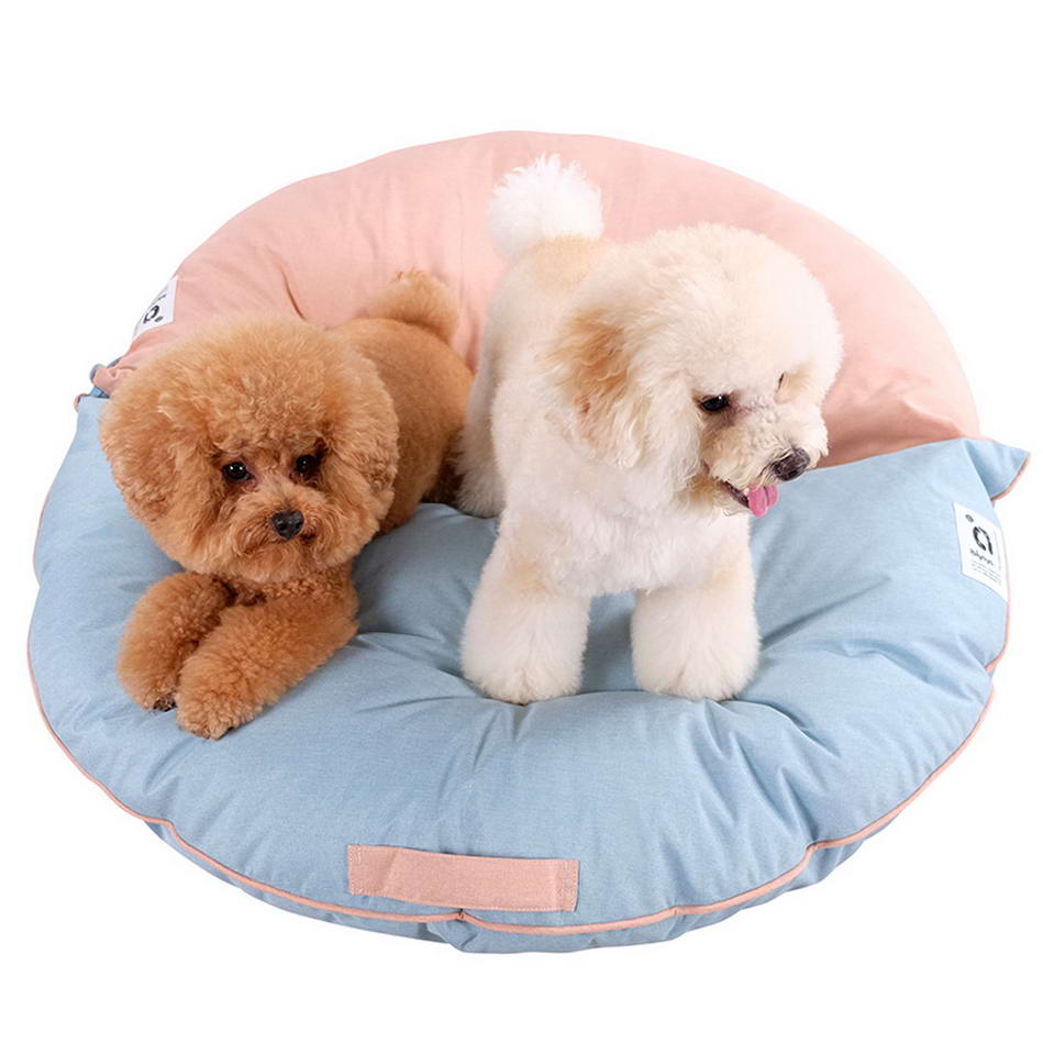 2 cuddly cushions with zip assembled to a large dog bed