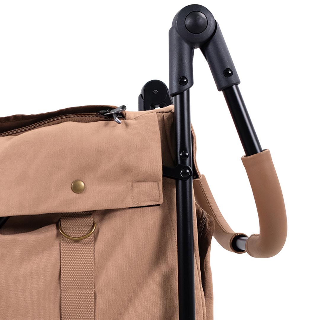 Height-adjustable leather-covered transport handle
