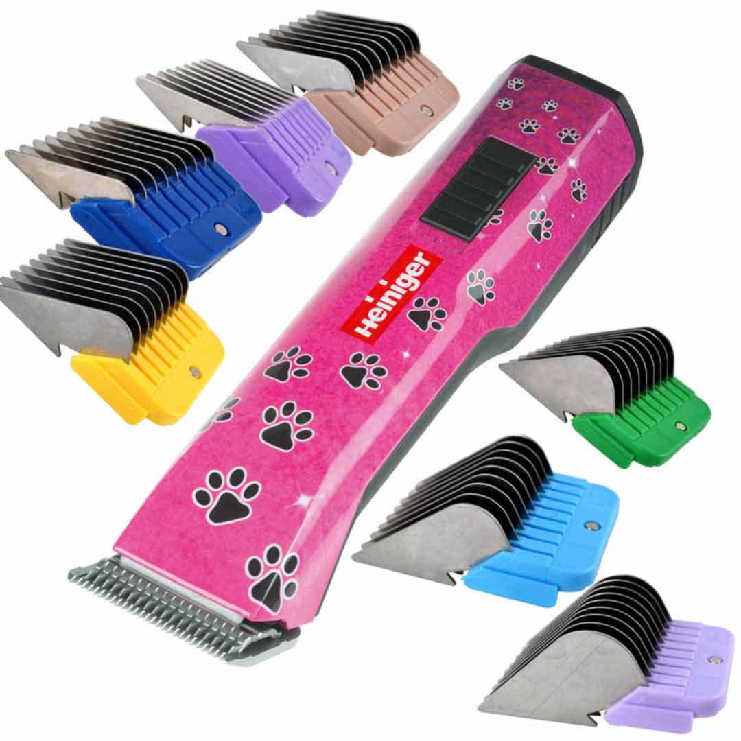 Heiniger Saphir Pink cordless pet clipper with blade and clip-on combs