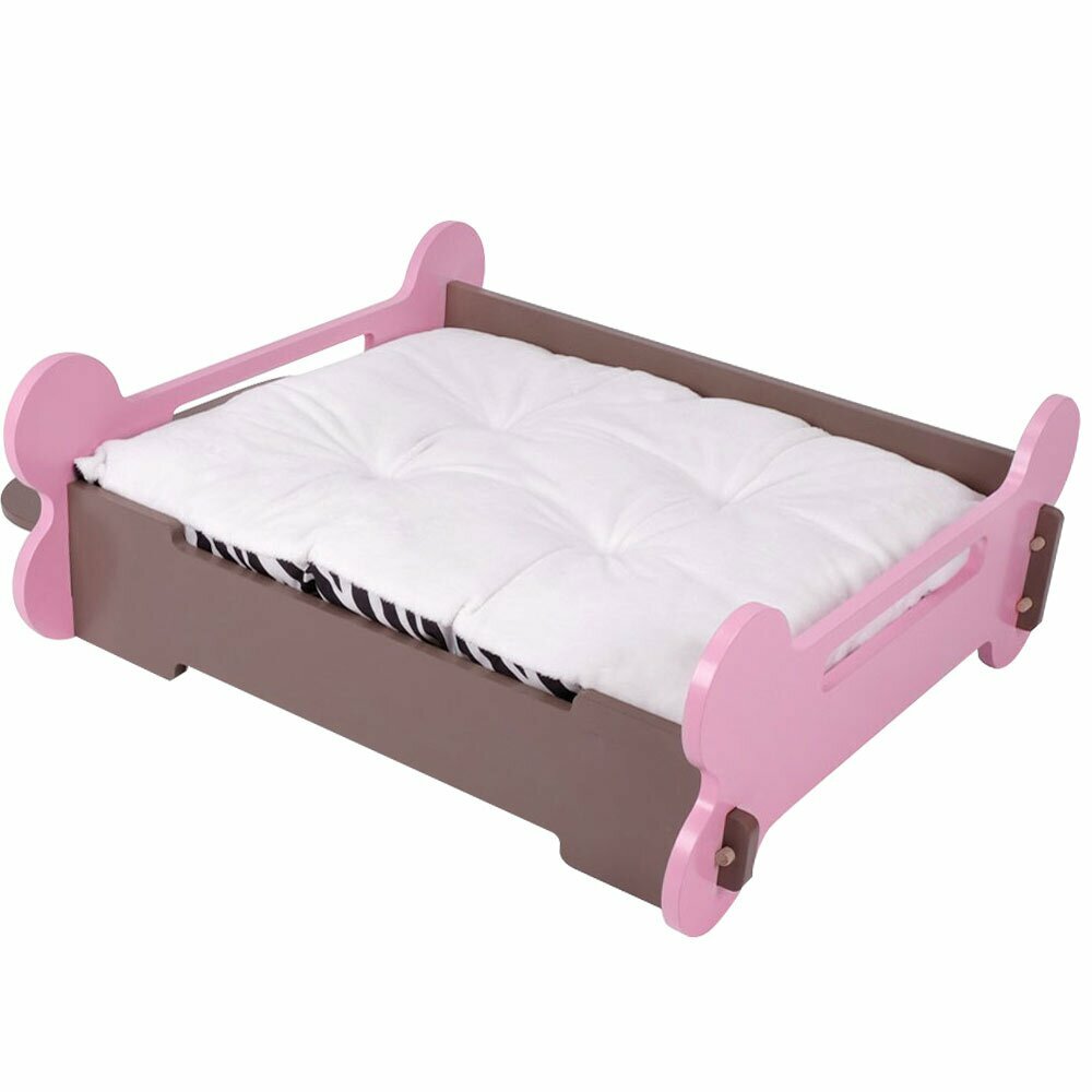 Pink dog bed with brown frame