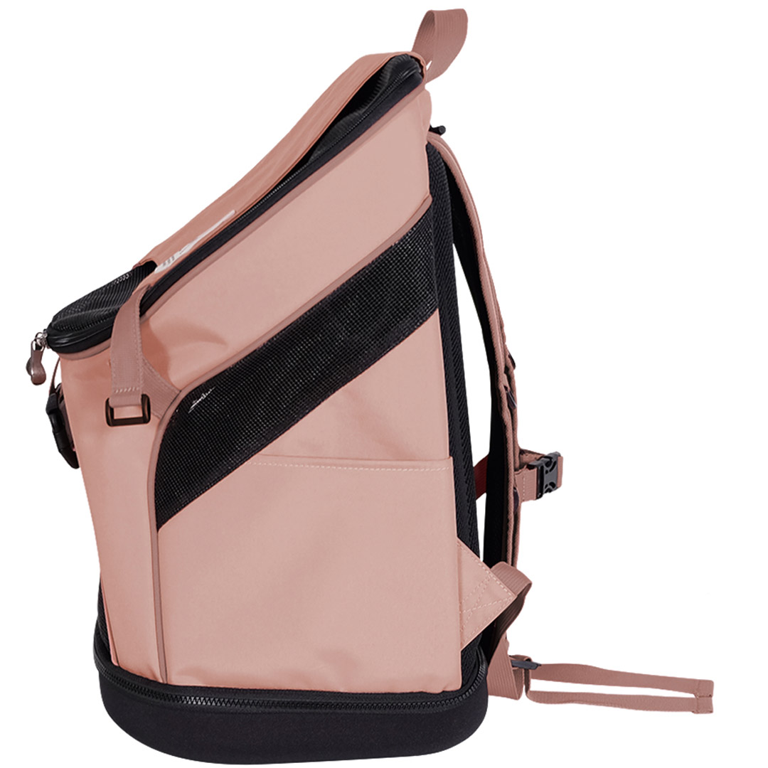 Ultra lightweight, spacious dog backpack in coral pink with padded back and adjustable straps