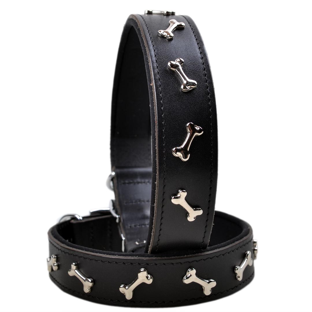 Handmade dog collars made of sturdy leather with soft lining and metal bone decor