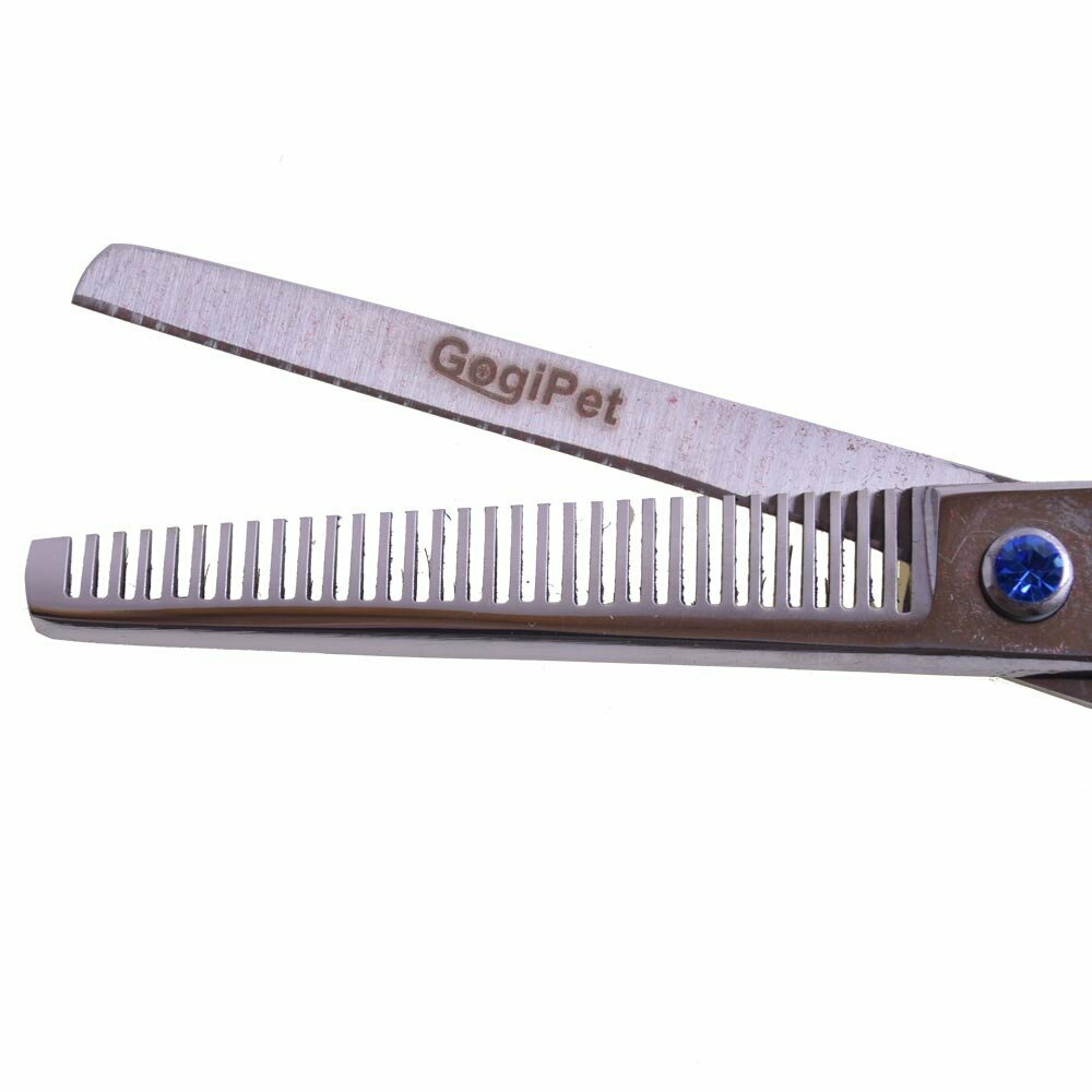 Single edge thinning scissor with mit 31 teeth