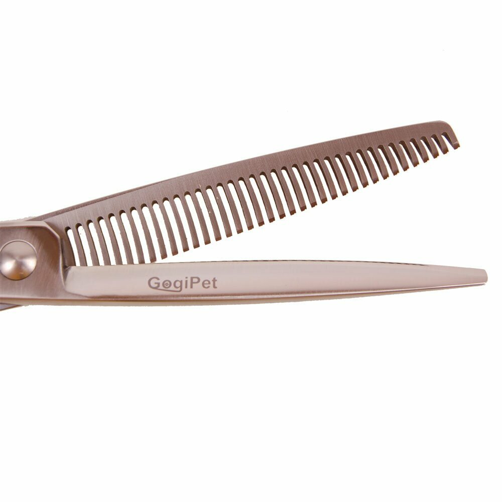 Left-handed thinning scissors where each tooth cuts