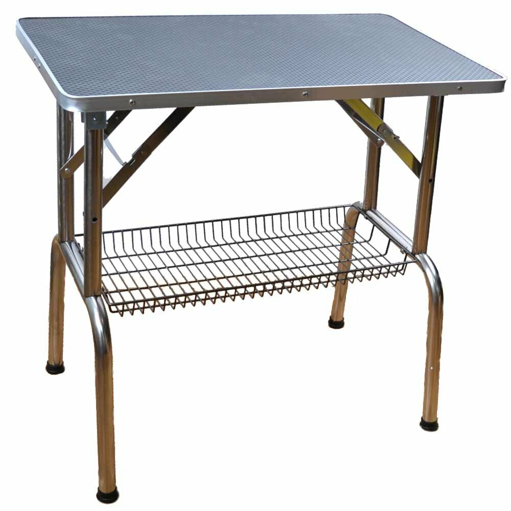 Robust folding grooming table with stainless steel construction