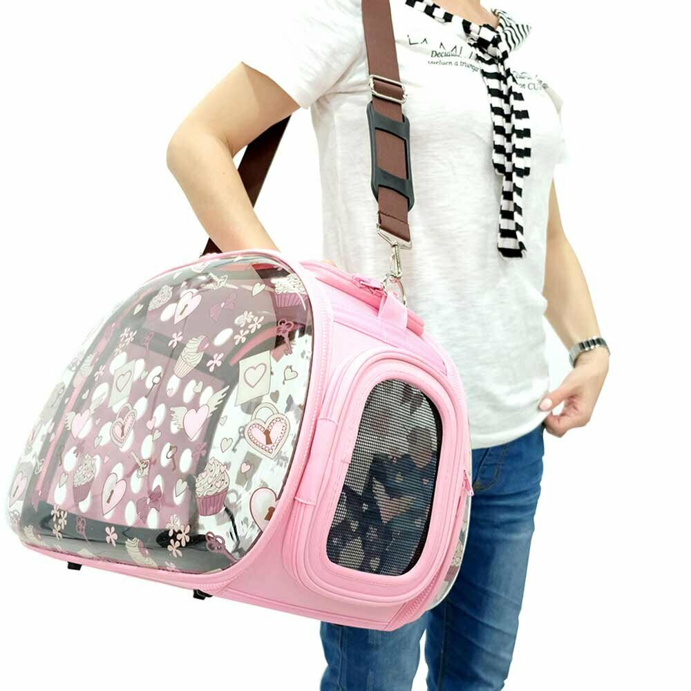 Pink dog carrier for fashion-conscious wearers